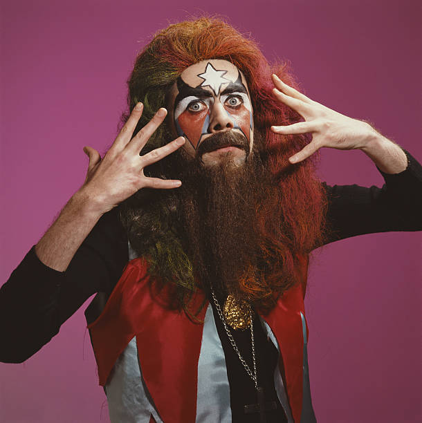 irish-comedian-sean-hughes-wearing-a-wig-false-beard-and-face-paint-picture-id482128087.jpeg